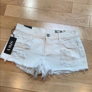 White distressed denim shorts